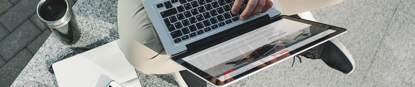 A person using computer outside