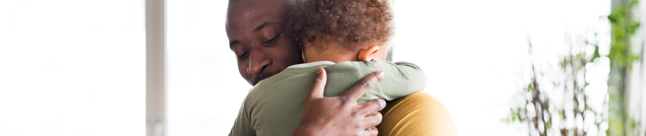 A father hugging his child