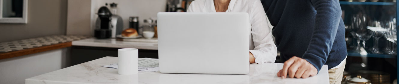 couple looking at laptop