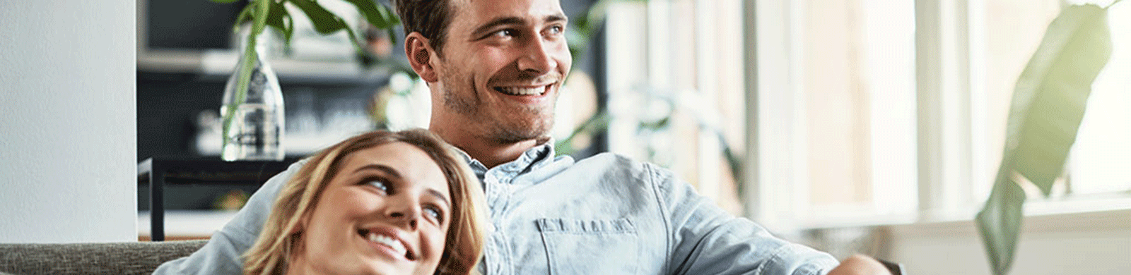 couple sitting together on couch