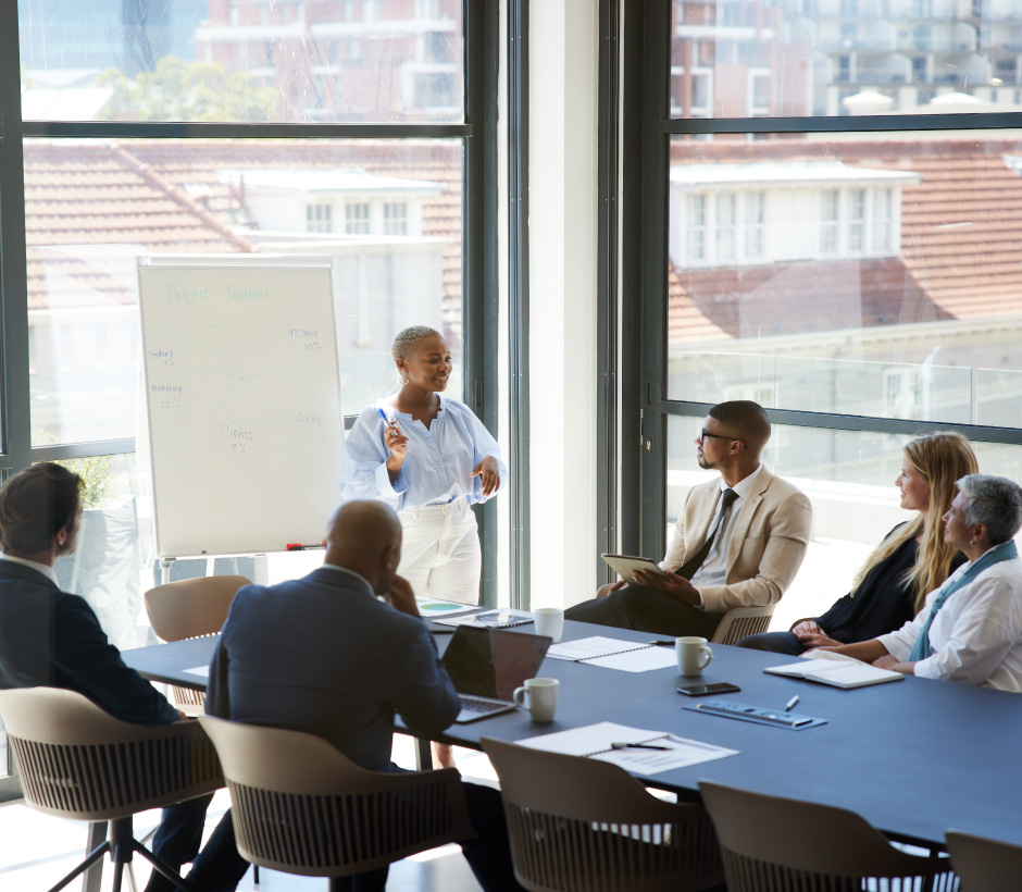 person presenting at business meeting