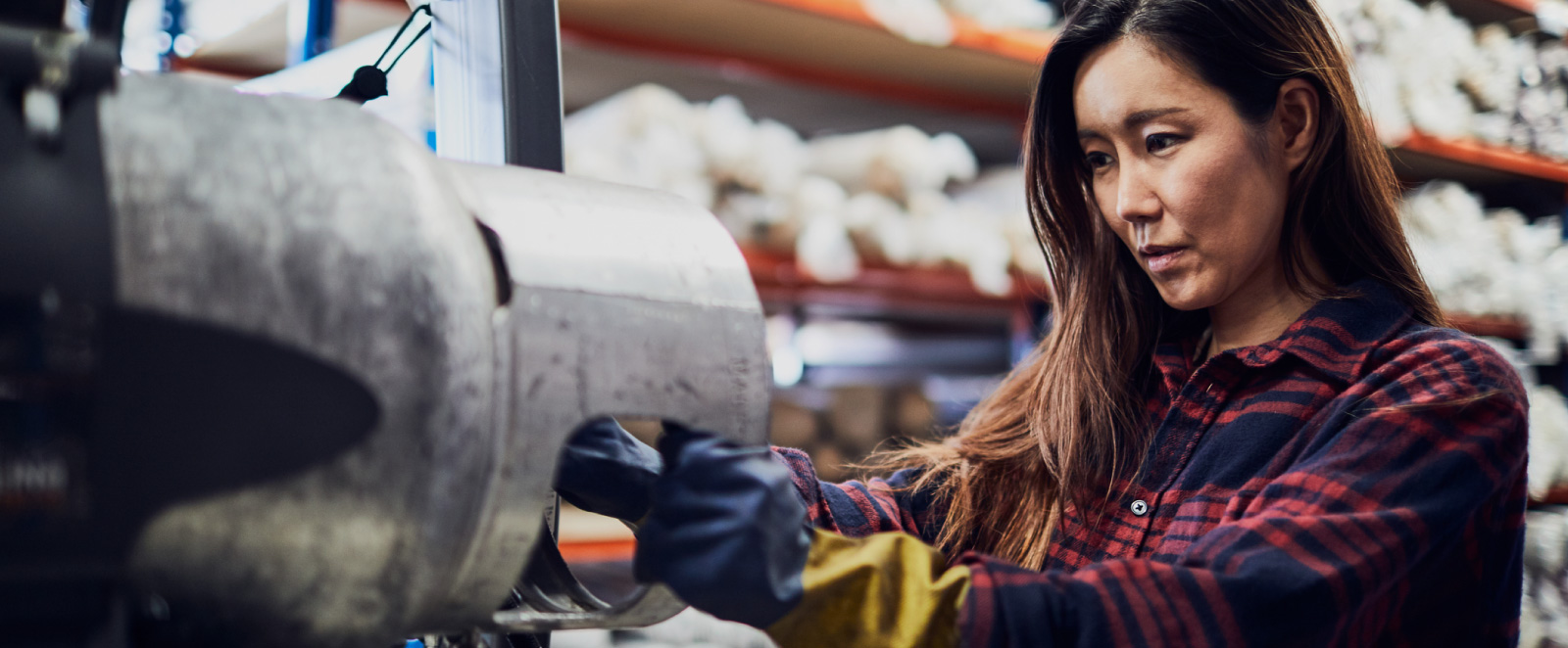 A female working with a machine