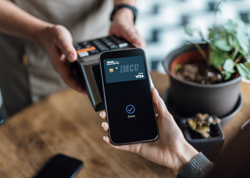 person paying with tap to pay