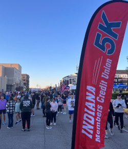IMCU logo on a 5k banner