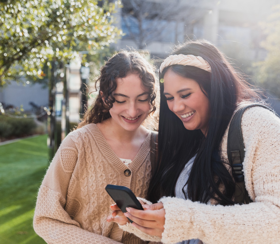 youth looking at a phone