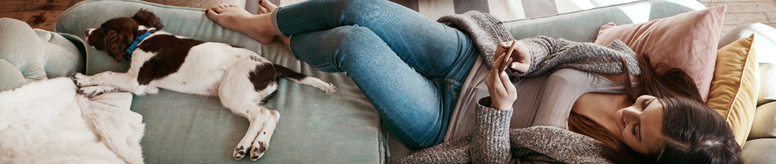 woman and dog on couch