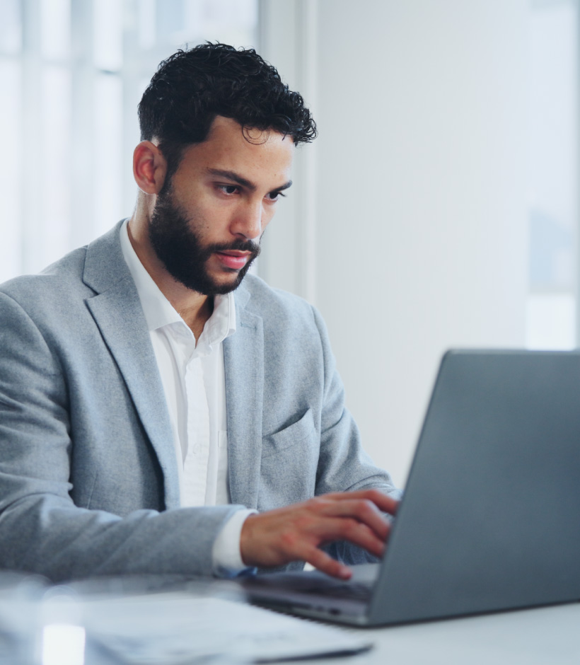 person typing on laptop
