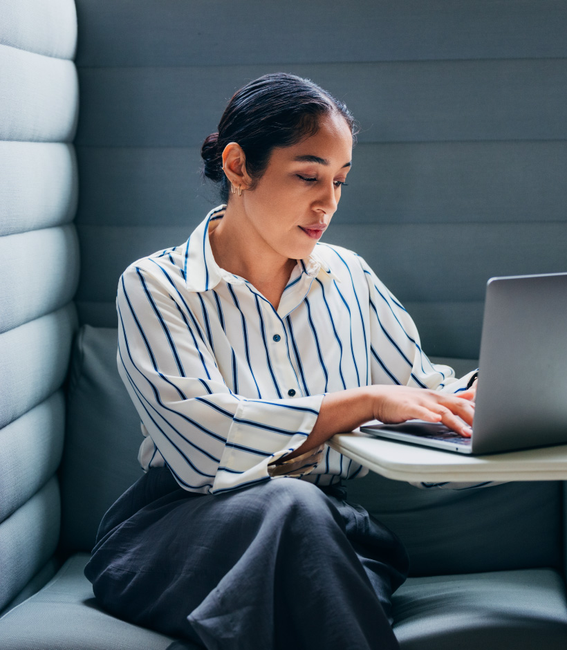person typing on laptop