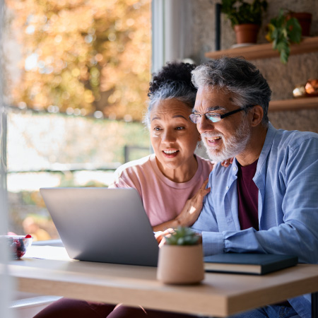 couple looking at laptop