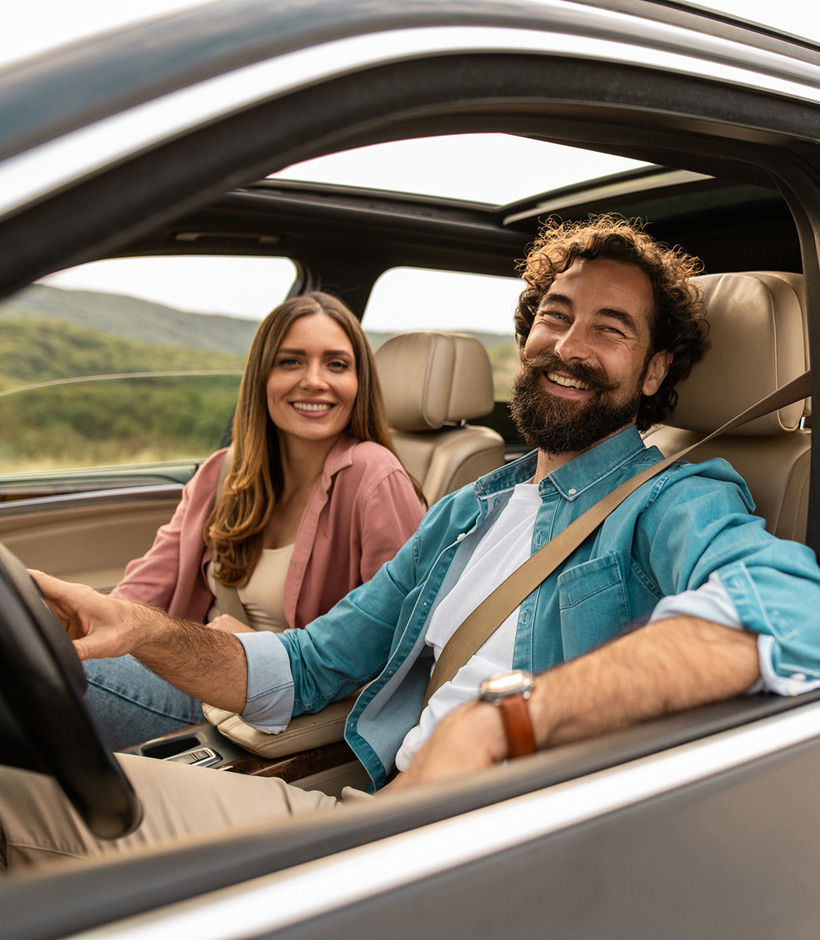couple in new car