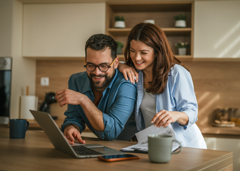 couple looking at laptop