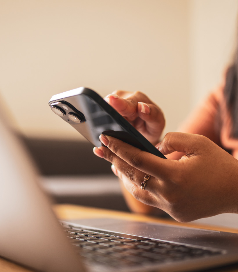 person typing on phone