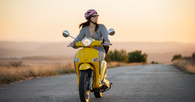 person riding moped
