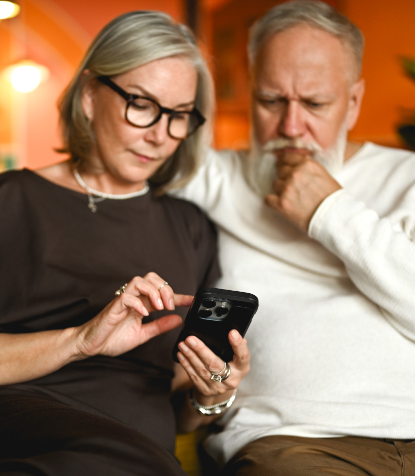 couple looking at phone