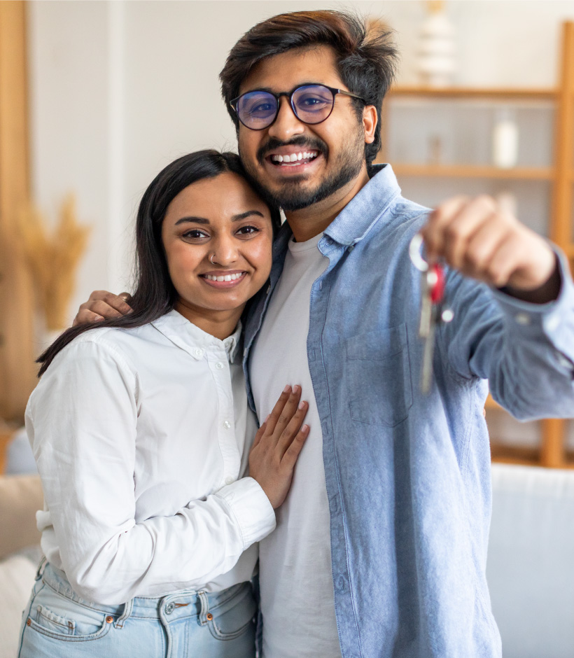 couple holding keys