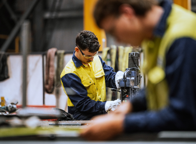 person working a factory