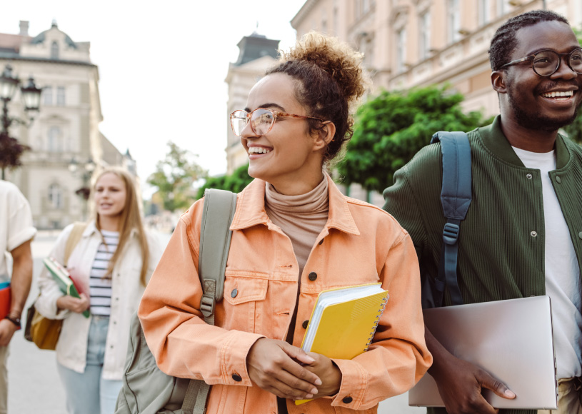 students with backpacks walking