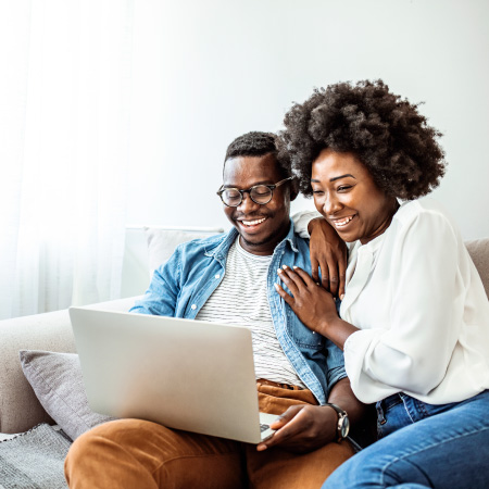 couple looking at laptop