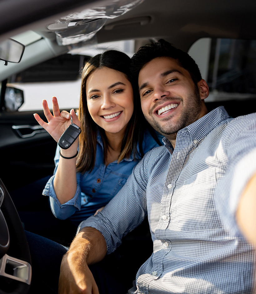 couple in new car