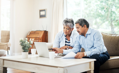 couple looking at laptop